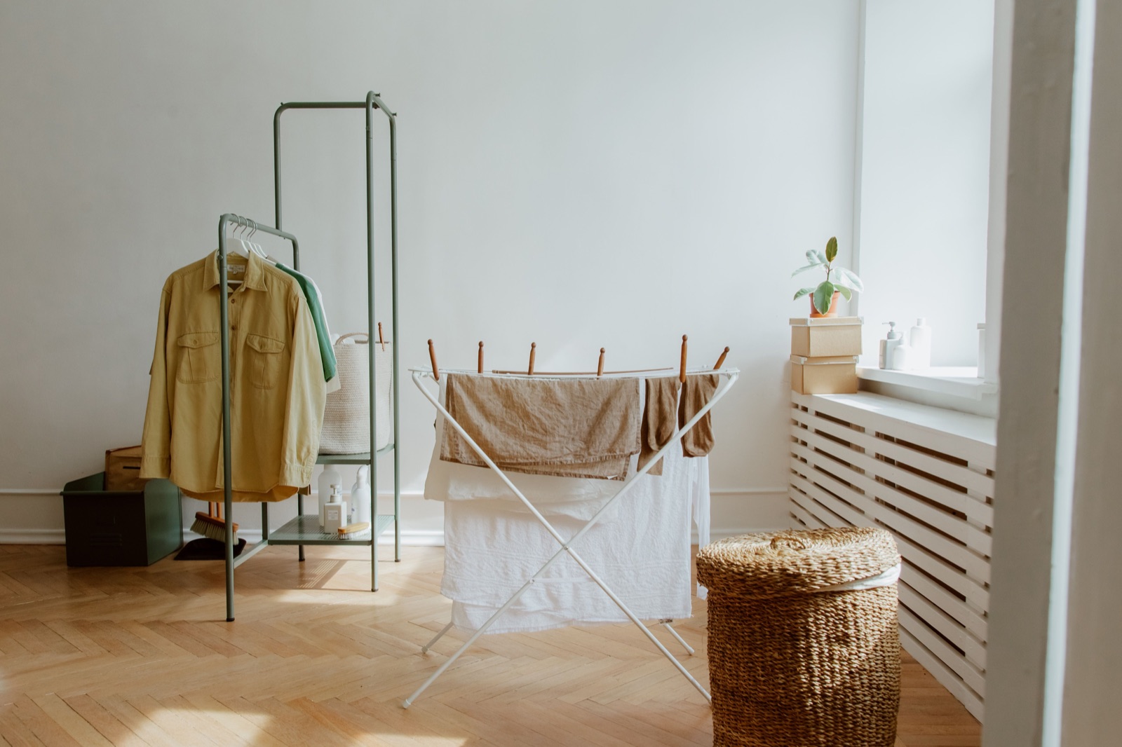 Indoor clothes drying rack in a bright, well-ventilated room